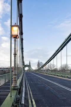 Hammersmith bridge over river thames london Stock Photos