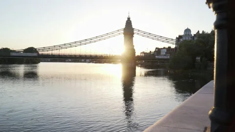 Hammersmith Bridge with setting sun Stock Footage 166527904