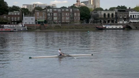 Hammersmith Man Rowing Up stream Stock Footage 91393746