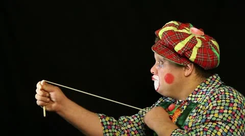 Hamming clown on black background Stock Footage 18091988