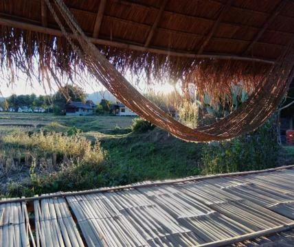 Hammock in a bamboo hut Stock Photos