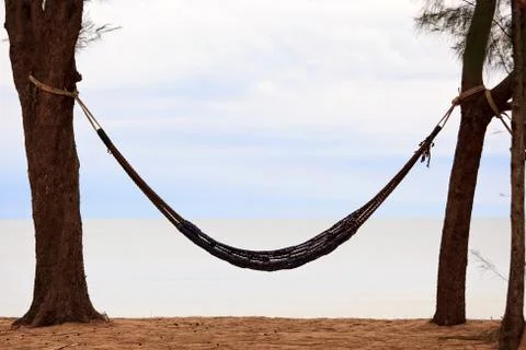 Hammock on beach Stock Photos