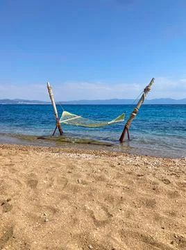 Hammock at the beach in summer Stock Photos