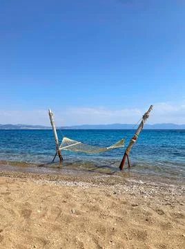 Hammock at the beach in summer Stock Photos