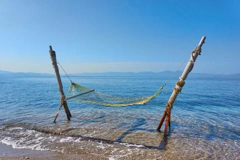 Hammock at the beach in summer Stock Photos
