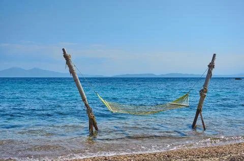 Hammock at the beach in summer Stock Photos