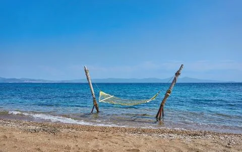 Hammock at the beach in summer Stock Photos