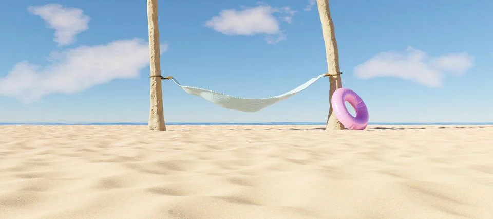 Hammock between two palm trees on the beach Stock Photos