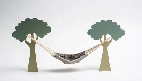 Hammock between two trees weekend lazy vacation rest and relaxation concept.. Stock Photos