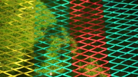 Hammock colorful net swinging back and forth. Abstract pattern Vídeo Stock 243939350