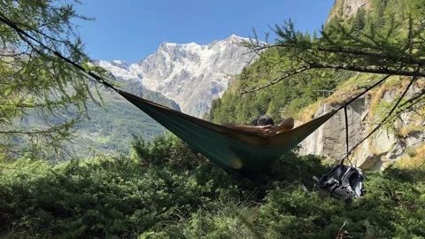 Hammock relax with Monte Rosa glacier, alpine summer landscape Italy Stock Footage 332359256