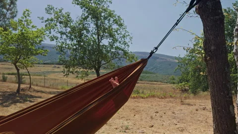 Hammock relaxation in the mountains surrounded by nature Vídeos de archivo 343656523