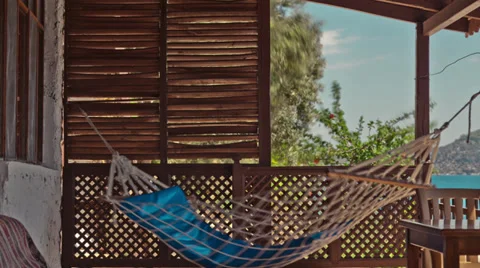 Hammock on the Seaside Patio Time Lapse Stock Footage 32025845