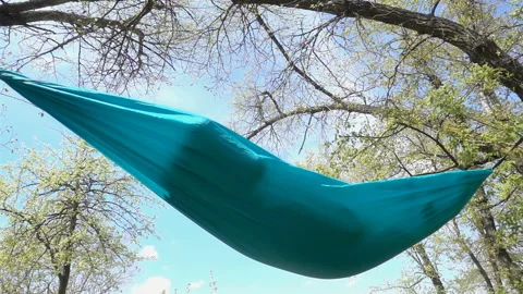 Hammock swinging in slow motion Stock Footage 159540657