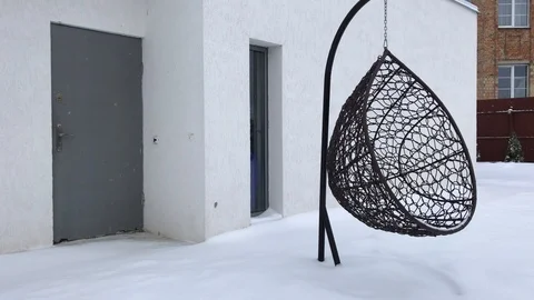 Hammock swinging in the wind in winter Stockbeeldmateriaal 103463211