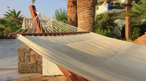 Hammock under a Palm tree Stock Footage 32357360