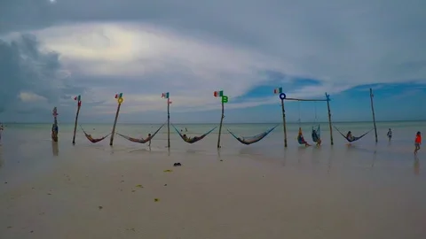 Hammocks over the water in Holbox Stock Footage 94706734