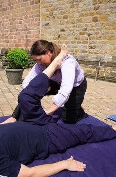 Hamstring being stretched Stock Photos