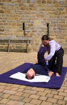 Hamstring massage Stock Photos