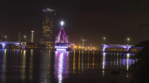 Han river bridge in Danang is opening in the evening Stock Footage 99279072