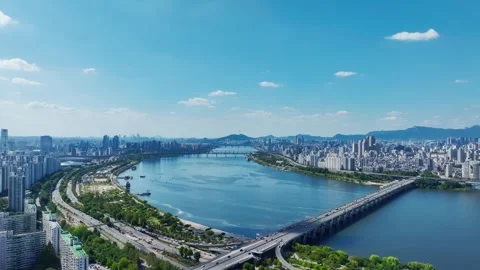 The Han River, Railway Bridge and Olympic Bridge from Jamsil in Seoul Stock Footage 346466617