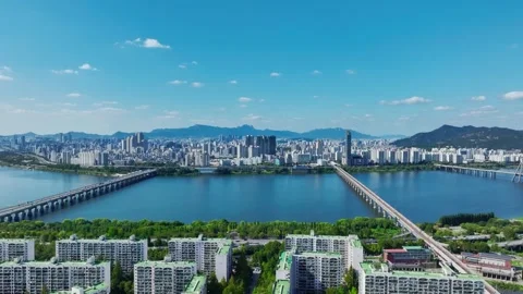 The Han River, Railway Bridge and Olympic Bridge from Jamsil in Seoul Stock Footage 346468748