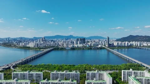 The Han River, Railway Bridge and Olympic Bridge from Jamsil in Seoul Stock Footage 346469071