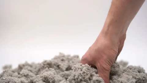 Han touching Eco-friendly cellulose insulation. Vídeo Stock 126556793