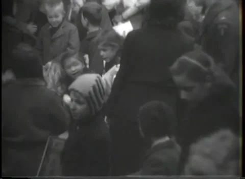 HANAU, GERMANY - 1947: Party crowd - Children press through a crowded party Stock Footage 344488347