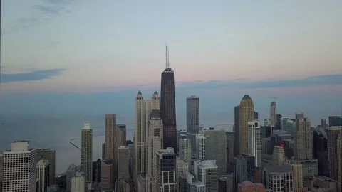 Hancock Building with Navy Pier in Background - 4k Aerial Video stock 104093394