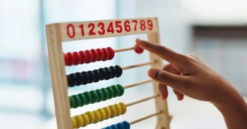 Hand, abacus and child learning math for brain development, study or arithmetic Stock Photos