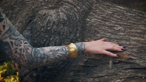 Hand with abstract tattoo strokes trunk tree. Black Gothic manicure nails Stock Footage 172067389