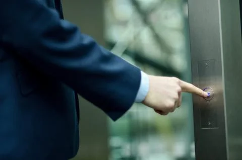 Hand access buttons on an elevator Stock Photos