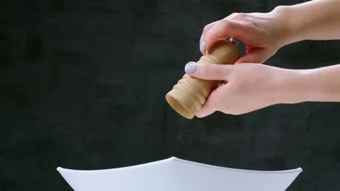 Hand adding spices Stock Footage 300386053