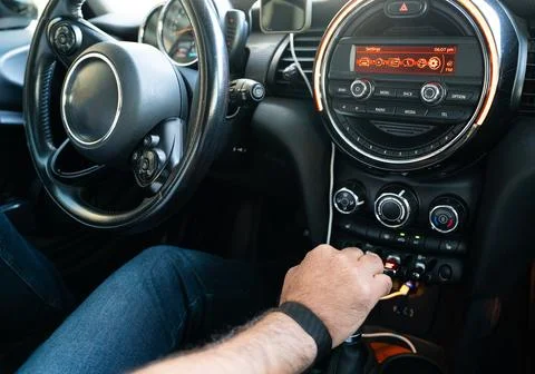 Hand Adjusting Car Dashboard Controls Inside Modern Vehicle Interior Close Up Stock Photos