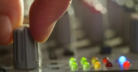 Hand Adjusting Equalizers, Dj Mixing Music On An Audio Mixer Stock Footage 77626742