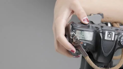 Hand adjusting modern professional camera Video stock 153825072
