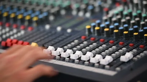 Hand adjusting professional audio mixer Stock Footage 62523790