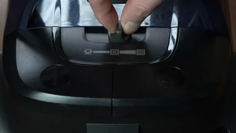 Hand Adjusting Setting on Appliance Close-Up Image Stock Footage 306135839