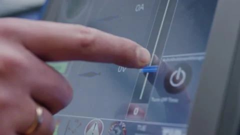 Hand adjusting settings on digital touch screen interface with slider control Video stock 156052719