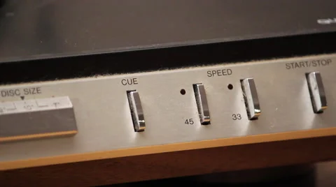 Hand Adjusting Turntable Settings Stock Footage 61438005
