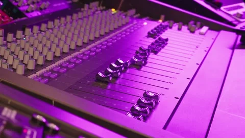 Hand Adjusts Fader On Professional Audio Mixing Console In Studio Stock Footage 330014037