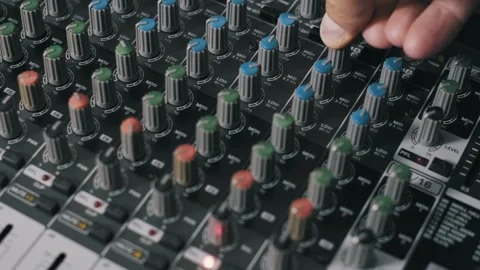 Hand Adjusts Mixer EQ Knobs Close Up Stock Footage 321311438