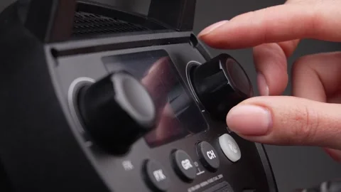 Hand Adjusts Studio Light Power Dial. Stock Footage 256236988