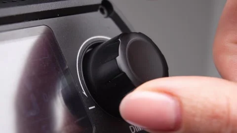 Hand Adjusts Studio Light Power Dial. Stock Footage 256237674