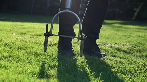 Hand aerator in the garden Stock Footage 303992303
