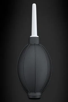 Hand air blower bulb for camera isolated on black background. Stock Illustration