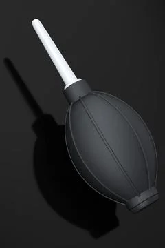 Hand air blower bulb for camera isolated on black background. Stock Illustration
