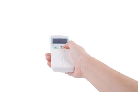 Hand with air conditioner remote control isolated on white Stock Photos