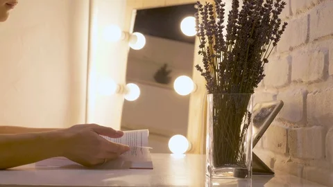 Hand and book: reading a book and holding your fingers along the lines. A woman Stock Footage 101289538
